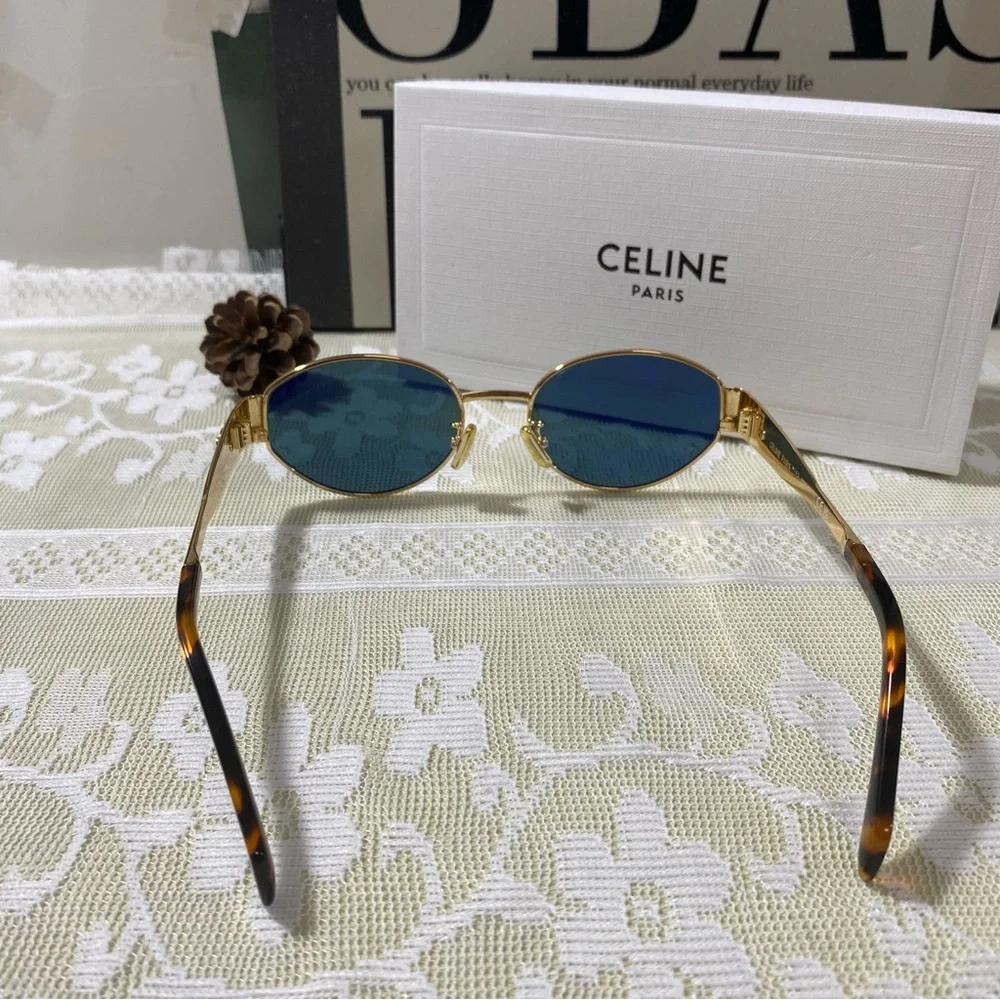 CELINE Gold Frame Oval Sunglasses with Green Lenses